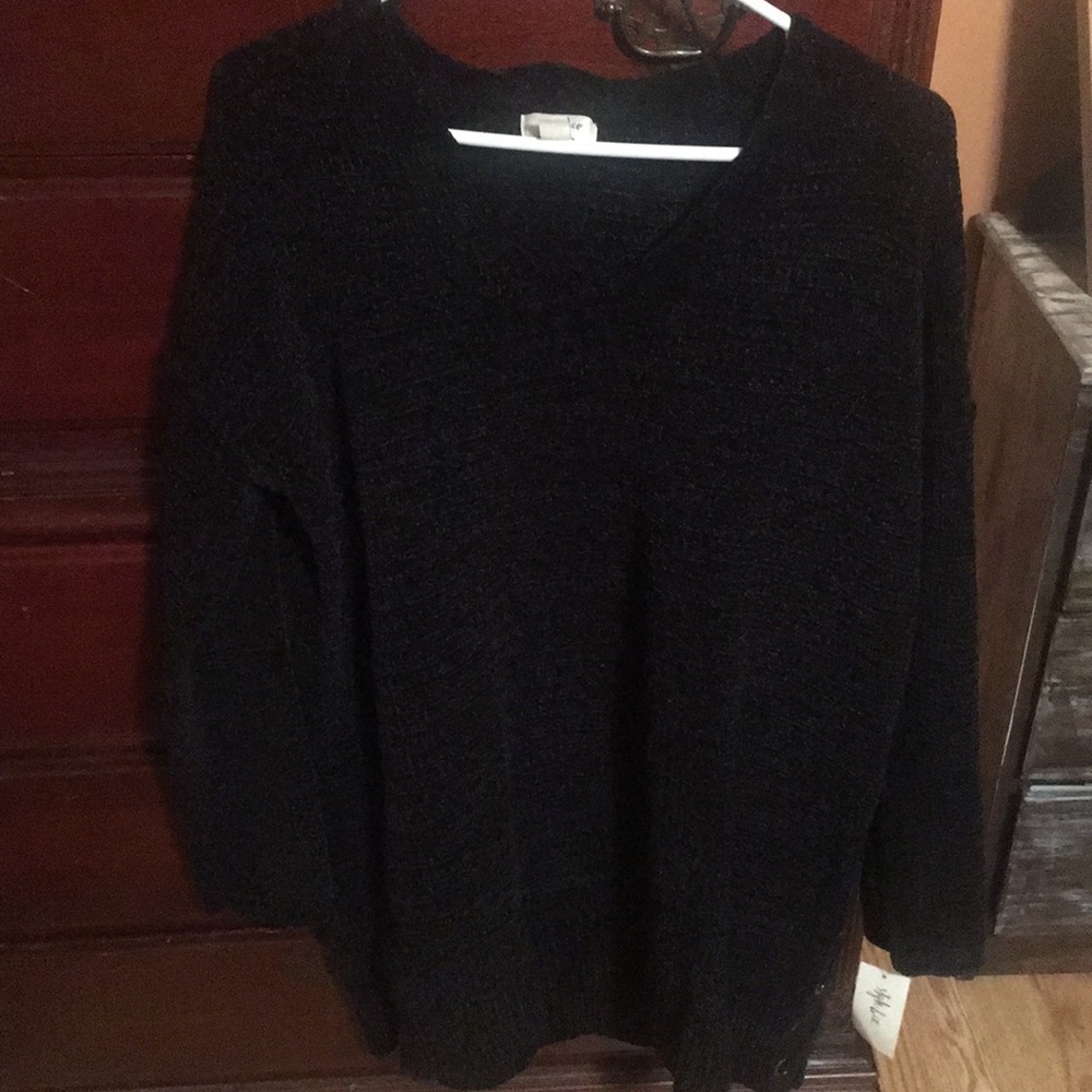 100 percent polyester, long black sweater